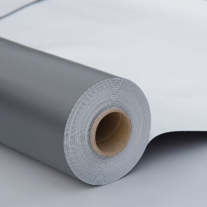 Commercial roofer applies TPO.